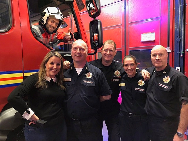 Chef Adam Reid with presenter Vicky Grimes, Watch Manager Mark Bamford, Firefighter Pete Griffiths, Firefighter Kate Lonsdale and Crew Manager Dave Dodson