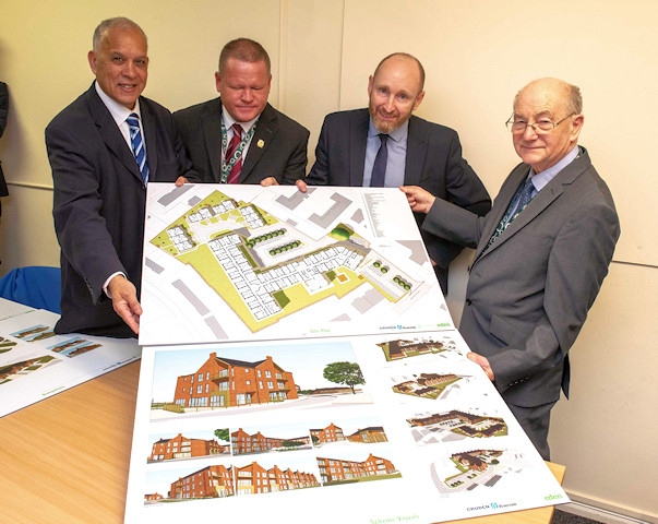 Cllr Daalat Ali, Cllr Phil Burke, John Glenton, Riverside Executive Director of Care and Support and Cllr Billy Sheerin studying the new development off the plans