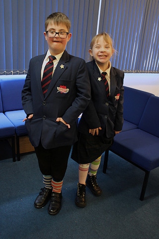 Michael Simpson and Gabriella Greenwood wearing odd socks for World Down Syndrome Day