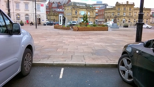 Wheelchair users forced into road to reach dropped kerbs