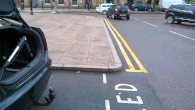 Wheelchair users forced into road to reach dropped kerbs