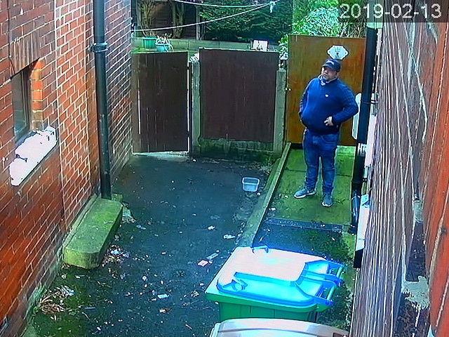 Police want to speak to this man in connection with a burglary in Rochdale