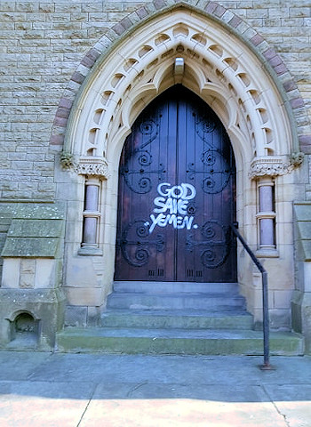 The doors have been painted with the words 'GOD SAVE YEMEN'