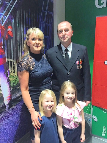 Mr Dalton with partner Michelle Procter and their daughters, Freya and Harriet