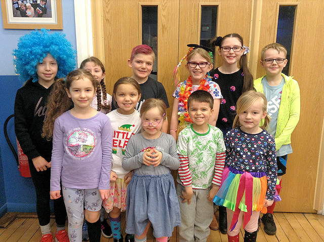 Pupils at Holy Trinity C of E Primary School, Littleborough, wearing funky socks and colourful outfits.  The school raised a massive £724 for the charity.