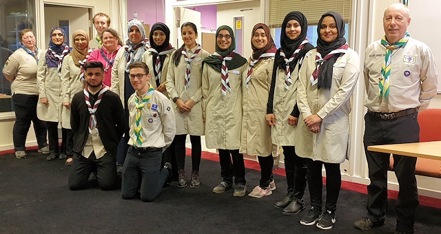 The leaders in their burgundy and sky blue neckers, led by Group Scout Leader, Wafa Takheroub, together with some of the Pennine district leaders who have been assisting.