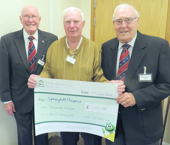 Jack Croll, Peter Miller and Worshipful Master Frank Durns from the Lodge of Harmony no 298 with their cheque for the Hospice