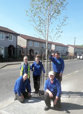 The Green Team with one of ten trees planted on Waithlands Road