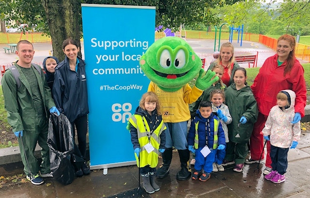 Co-op Funeral Care and Genesis Nursery team up to clear up their local park during Go Green for Springhill Hospice 