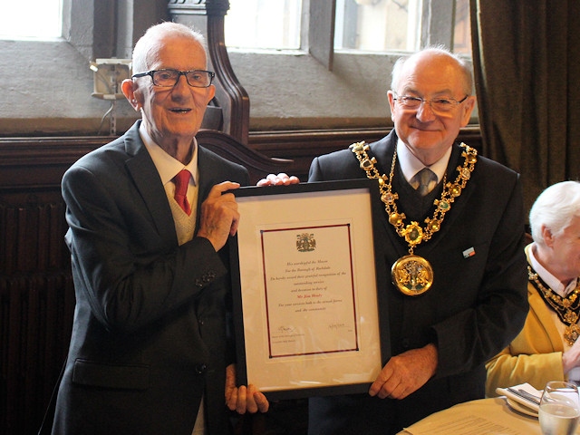 Mayor of Rochdale, Councillor Billy Sheerin, presents Jim Healy with his special certificate