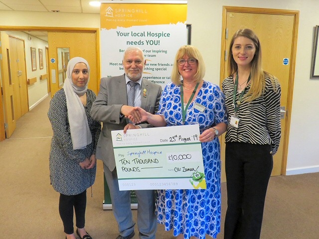 Retired mayor, Councillor Mohammed Zaman, presented a cheque of £10,000 to Springhill Hospice