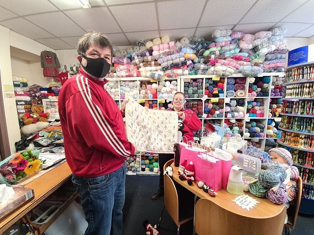 Richard Gelling and Siouxsie Hampson with the handstitched blanket