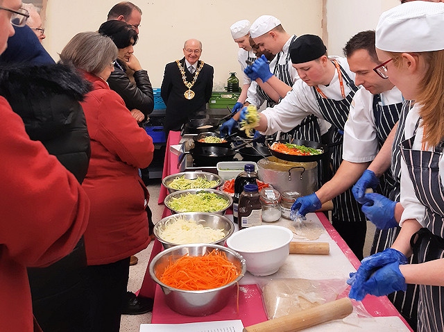 Hopwood Hall College chefs cooked stir fry at Wheatsheaf Shopping Centre