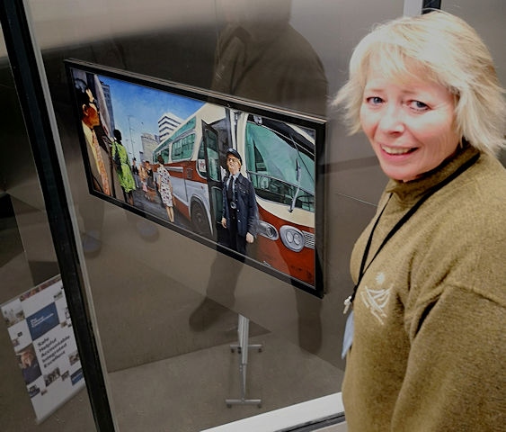 Lisa Andrews with the painting of mum Kathleen