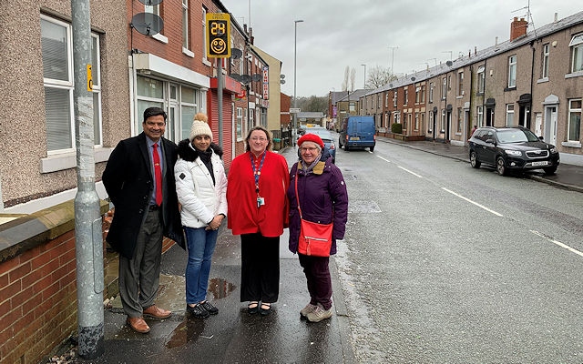 L-R: Councillors Faisal Rana, Rachel Massey and Wendy Cocks with community campaigner Iram Faisal (second left) with the new sign