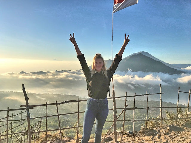 Danielle Wilson, pictured at the top of Mount Batur in Bali