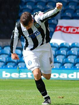 Le Fondre wheels away after scoring his first goal