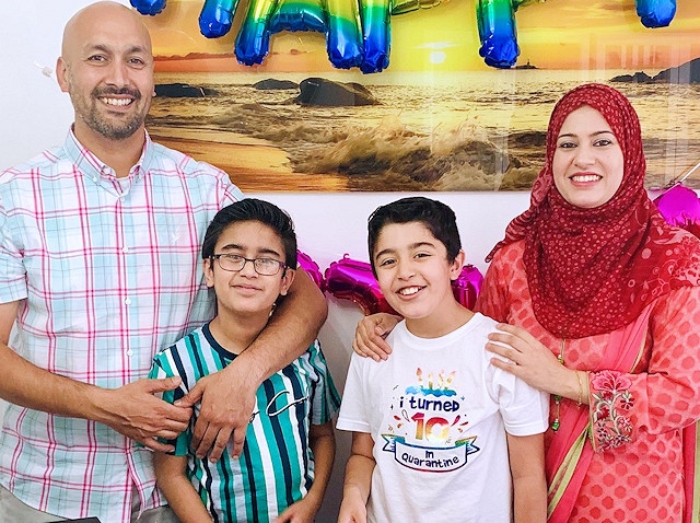 (L-R) Aiman's father Usman, Aiman, younger brother Rayyan and mother Sabrina