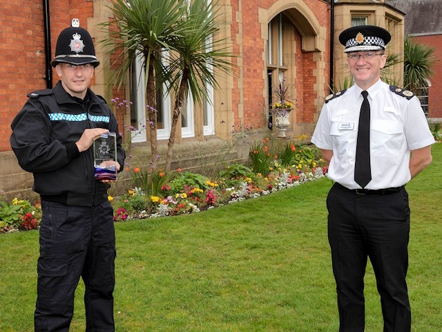 PC Nicholas White (left) was presented with the Carl Pilling award by Chief Constable Ian Hopkins (right)