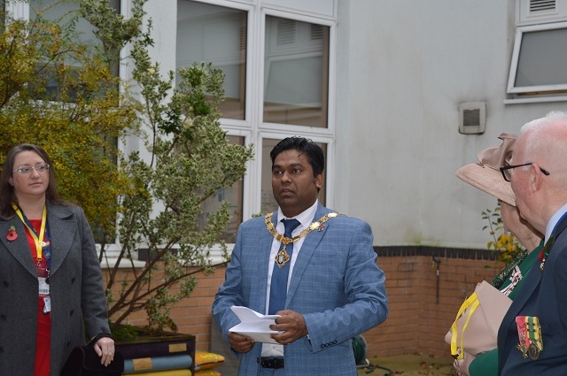 The dedication of the remembrance garden at Oulder Hill