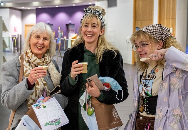 Guests try a Christmas soup made from ingredients that would otherwise have been thrown away