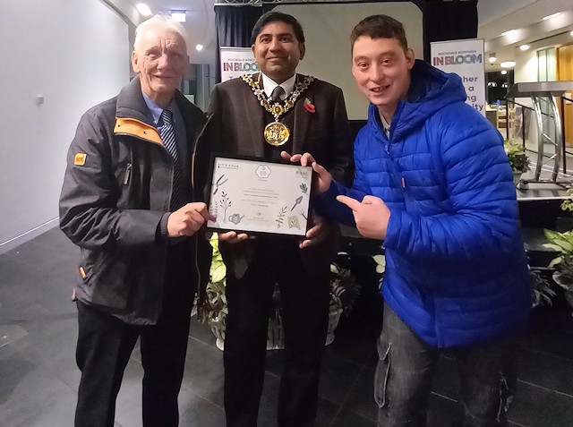 Nathan (right) has helped the PIER team achieve a ‘Level 5 Outstanding’ In Bloom Award earlier this year, pictured at the In Bloom Awards