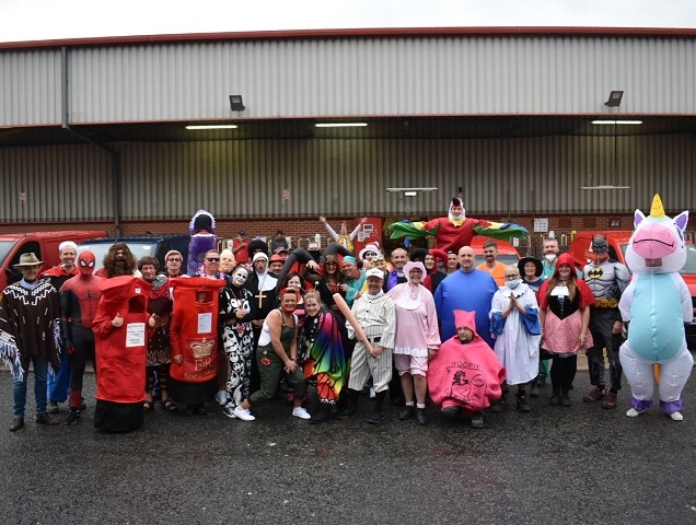 The postal workers donned fancy dress for MIND