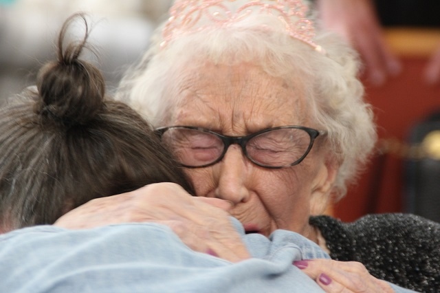 Ethel in an emotional embrace with grandson Mark