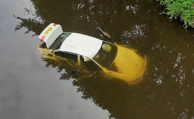 The BMW in the canal