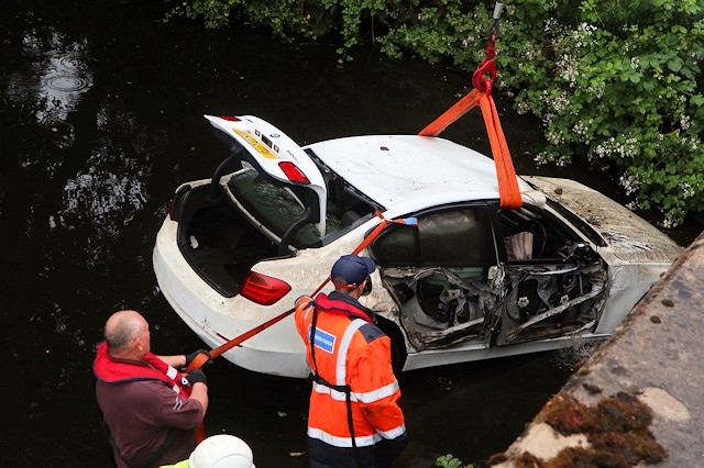 The BMW being removed from the canal, Photo - David Bennett, rochdale canal