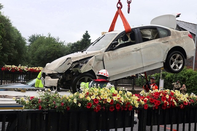 The BMW being removed from the canal, Photo - David Bennett, rochdale canal