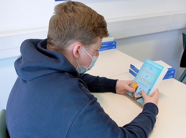 Rochdale Sixth Form College student with one of the free novels