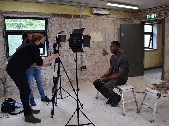 One of the Hopwood Hall apprentices filming for Historic England