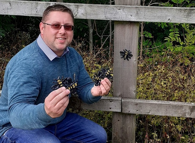 Norden ward councillor Peter Winkler with some of the bees