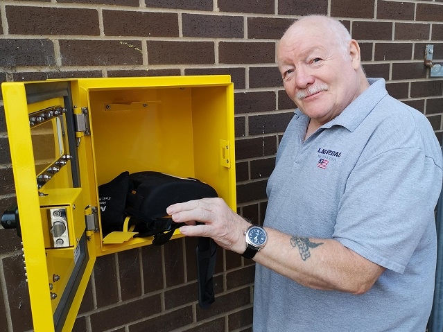 Chairman of Rochdale Judo Club, Warren Schofield 7th Dan, proudly demonstrates the open cabinet