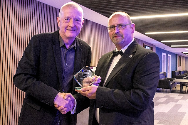 Steve Davis with Burnley volunteer winner Phil Chamberlain