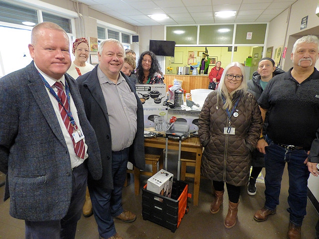 Councillor Neil Emmott with councillor colleagues, Middleton residents and Bowlee Pavilion volunteers at the launch of the warm spaces scheme