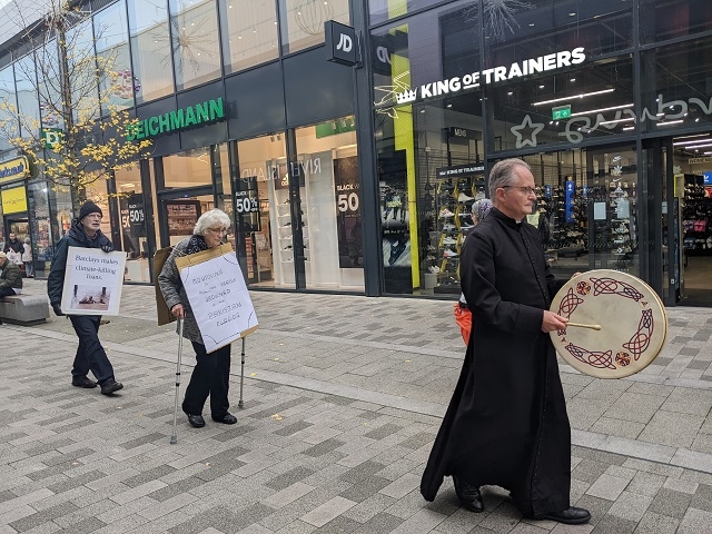 Extinction Rebellion activists held a mock funeral procession at Barclays bank, Rochdale