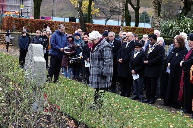 Olga Kurtianyk from the Association of Ukrainians in Great Britain (AUGB) Rochdale Branch at the Holodomor Memorial Stone