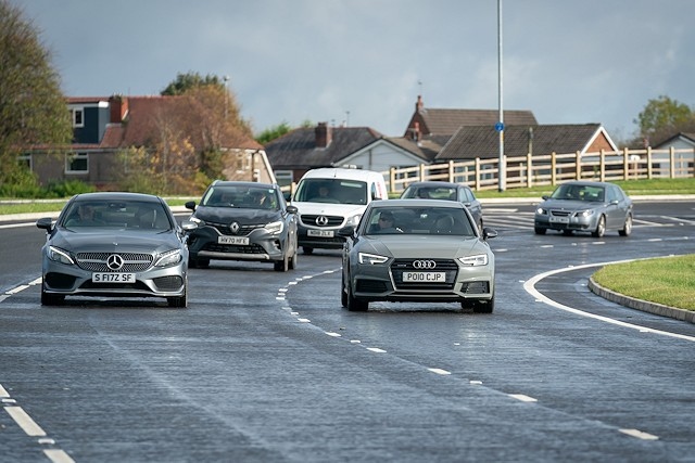 Cars on the new Queen Elizabeth II Way