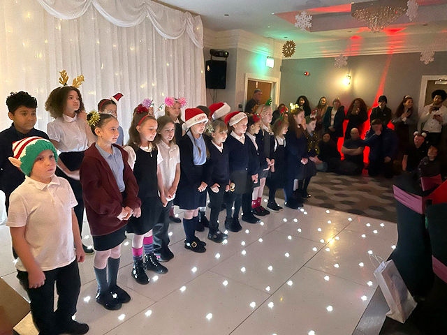 The Key Stage Two choir from Elm Wood Primary School