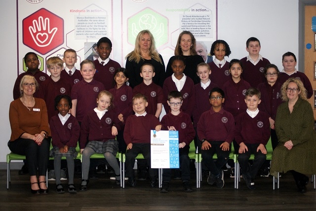 The Rights Respecting School Council receiving their gold certificate with Kathryn Gorton (front left) and Catherine Mullane (front right) both lead teachers for Rights Respecting Schools with Headteacher Aleksandra Hartshorne (back left) and Assistant Head Claire Smith (back right)