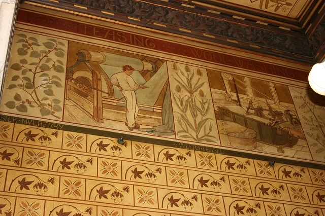 Painted panels in the town hall depicting the cotton industry, which was at its height when the town hall opened in 1871