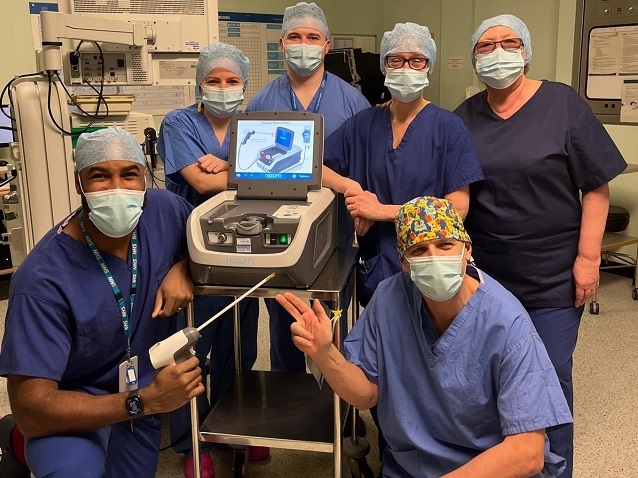 The team included Mr Sotonye Tolofari, consultant urologist (bottom left) and Dr Mike Hewitt Symonds, consultant anaesthetist (bottom right) along with the experienced scrub team at Rochdale operating theatres