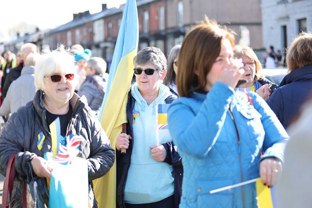 Olga Kurtianyk, chair of The Association of Ukrainians in Rochdale, watches the donations leave