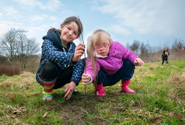 Ava Thomas (left) and Molly Sanderson, both in year 5 at St Luke's Primary School in Heywood, enjoyed planting the trees