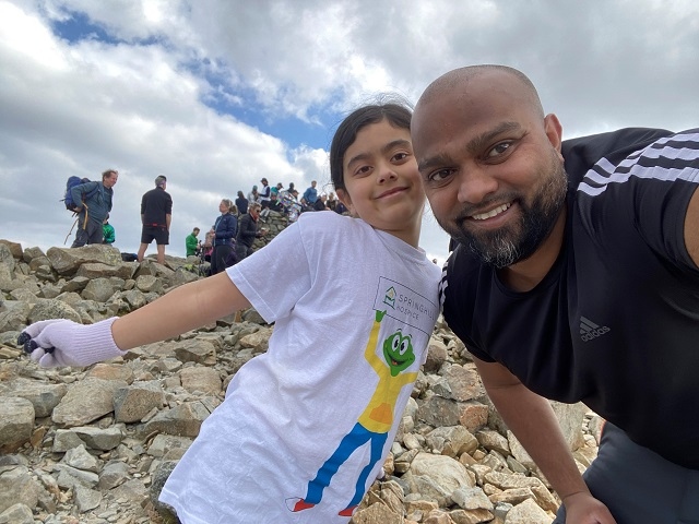 Zaara and her father, Doliz Miah at the summit of Scafell Pike