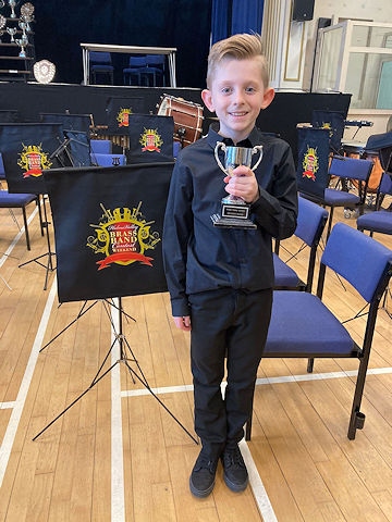 10-year-old cornet player Harry Dunning received a special award as the youngest player in the competition