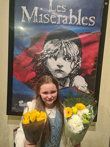 Elouise with the Les Misérables poster