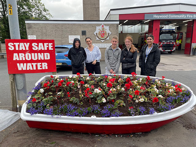 The youths with the floral display